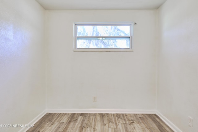 395 Arora Blvd, Orange Park, FL 32073 - empty room with wood finished floors and baseboards