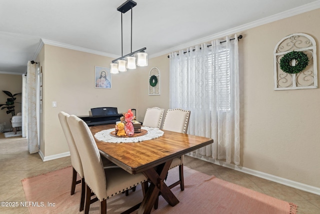 8880 Old Kings Rd S Unit 21, Jacksonville, FL 32257 - dining space with light tile patterned floors, crown molding, and baseboards