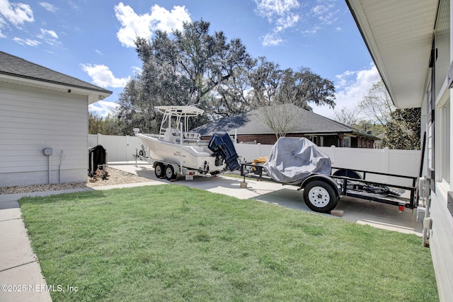 view of yard with a fenced backyard