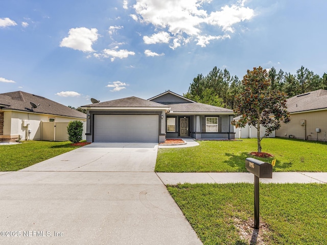 view of front facade with a front lawn, concrete driveway, an attached garage, and fence