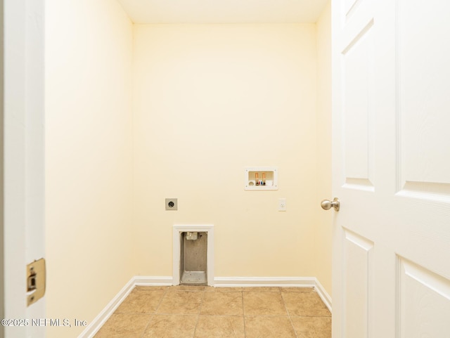 clothes washing area with electric dryer hookup, baseboards, hookup for a washing machine, and laundry area