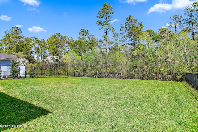 view of yard with fence