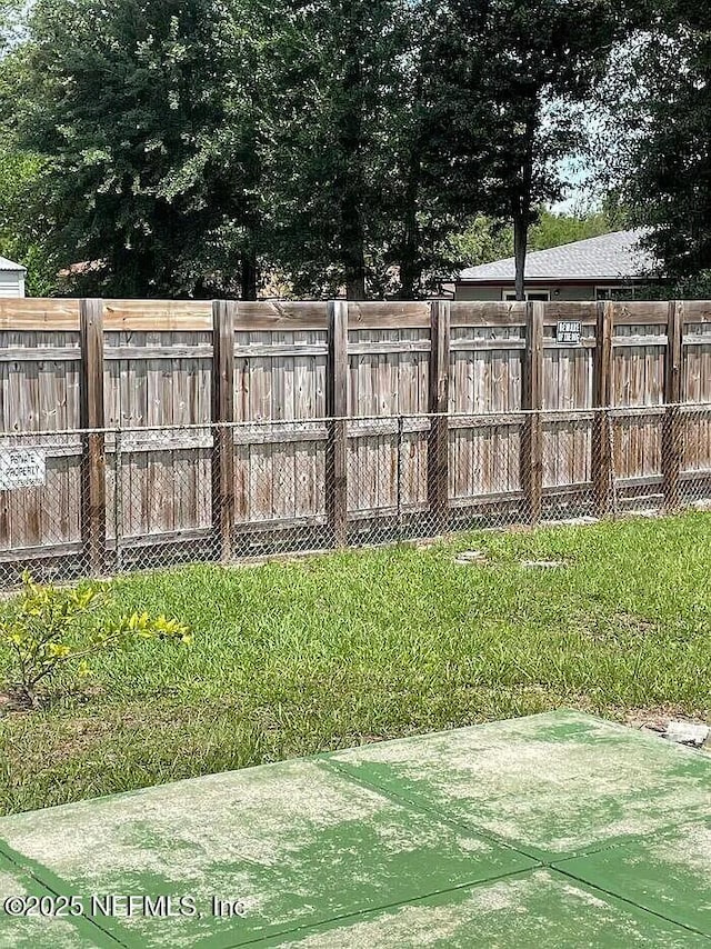 view of yard featuring fence