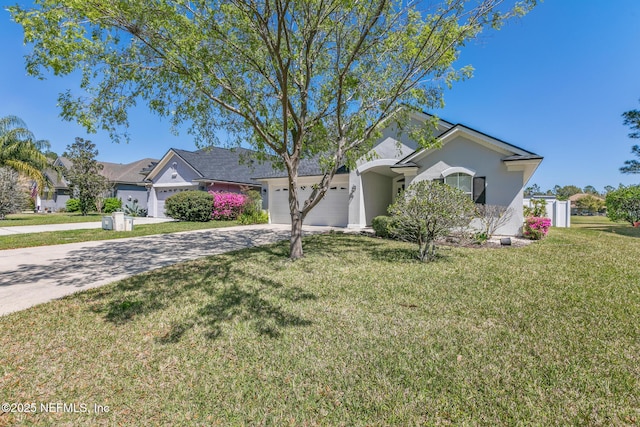 ranch-style house with a front lawn, an attached garage, driveway, and stucco siding