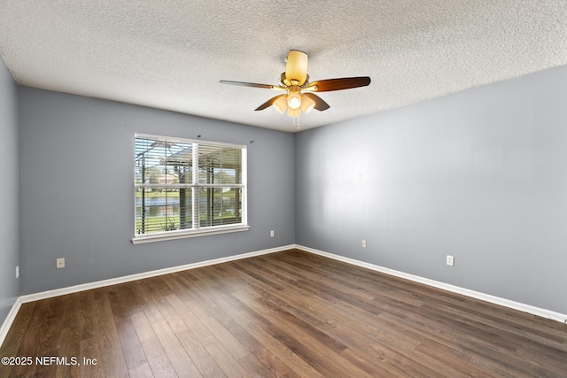 empty room featuring baseboards, a textured ceiling, wood finished floors, and a ceiling fan