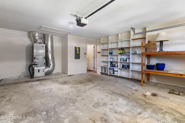 garage featuring electric panel and a garage door opener