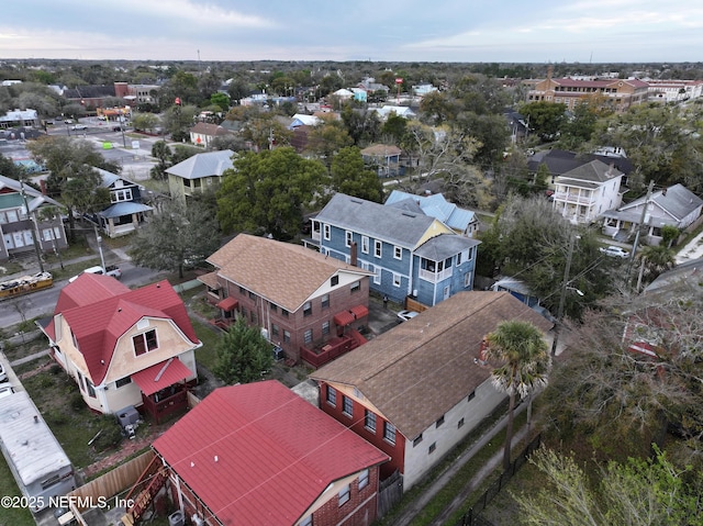 birds eye view of property with a residential view