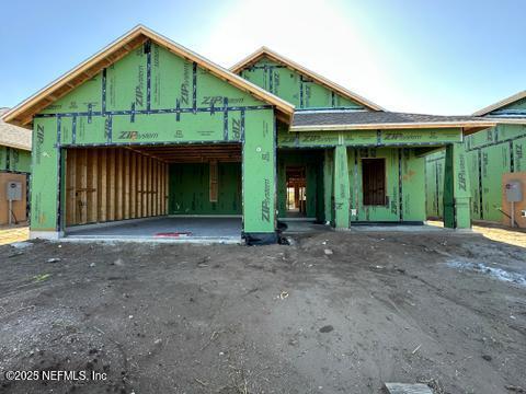 property under construction featuring driveway