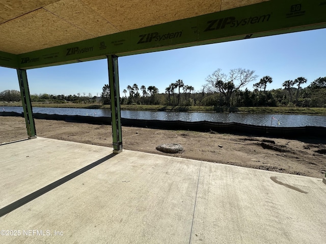 view of patio / terrace with a water view