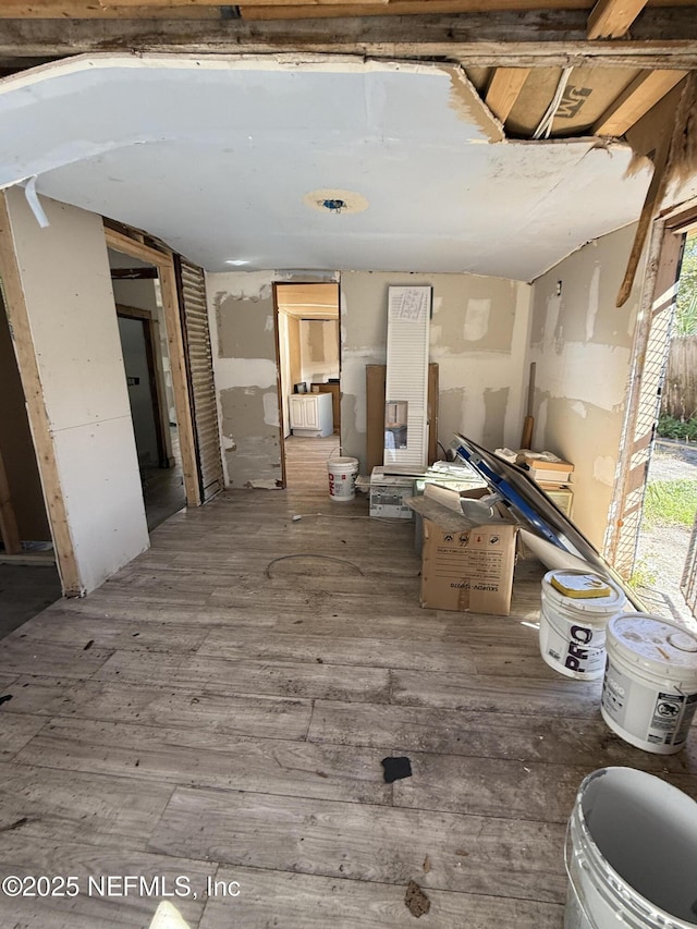 basement with wood finished floors