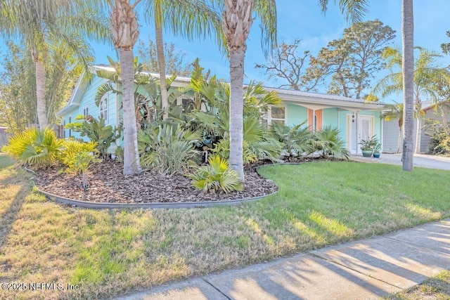 view of front of home with a front yard