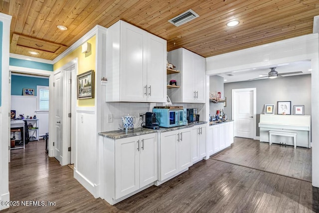 kitchen featuring visible vents, wooden ceiling, dark wood-style floors, a ceiling fan, and open shelves