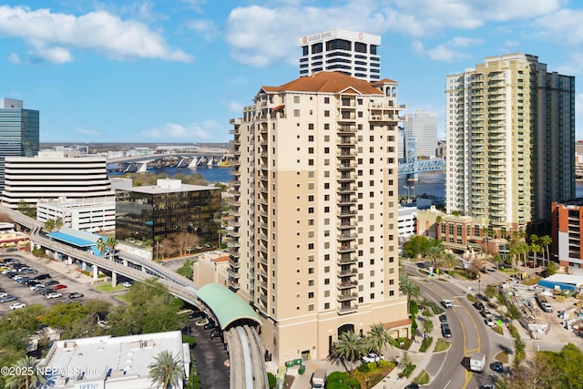 property's view of city with a water view