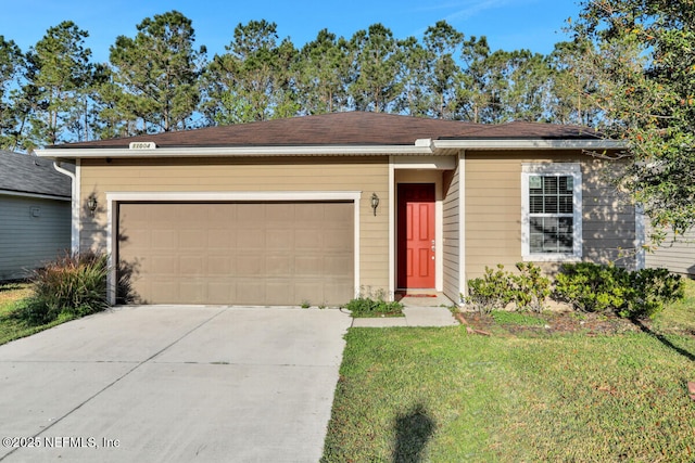 ranch-style house featuring a front lawn, an attached garage, and driveway