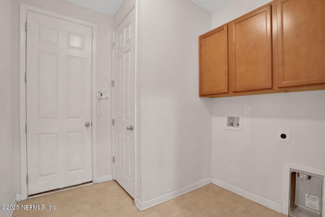 laundry area featuring baseboards, light floors, washer hookup, cabinet space, and hookup for an electric dryer