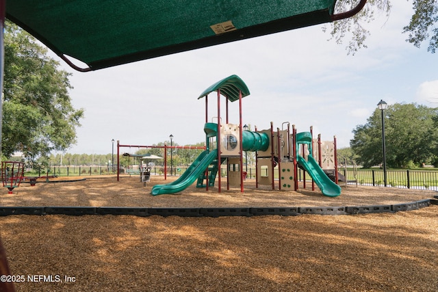 community playground featuring fence