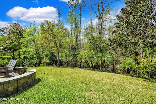 view of yard featuring fence