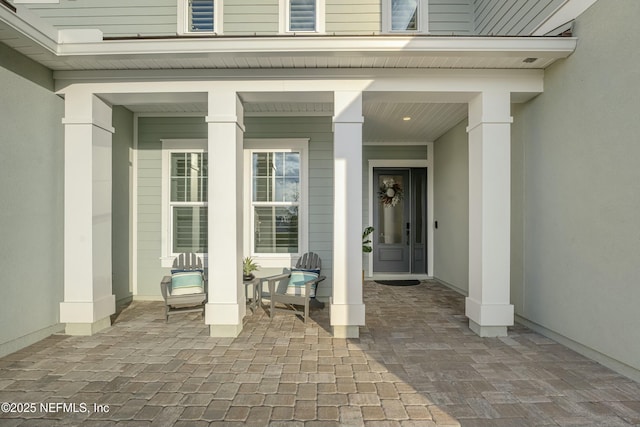 entrance to property with a porch