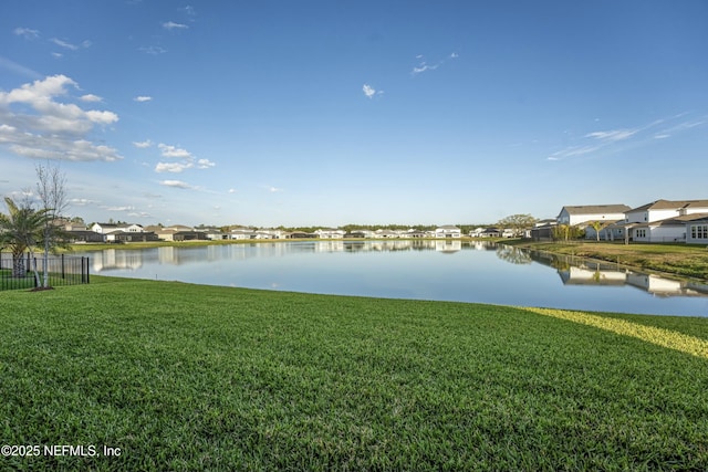 view of water feature with a residential view