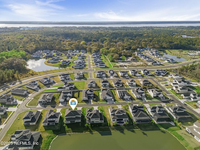 aerial view featuring a residential view and a water view