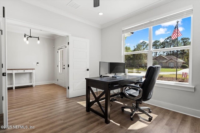 home office with baseboards, wood finished floors, and ornamental molding