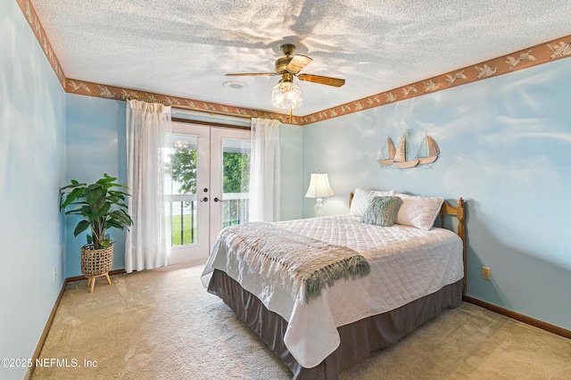 bedroom featuring access to outside, a textured ceiling, french doors, and carpet floors