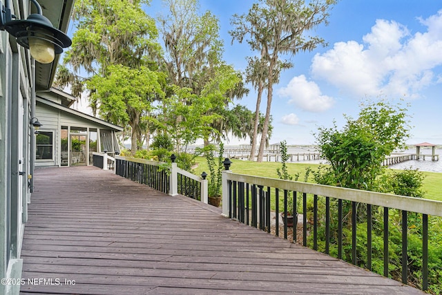 wooden deck with a water view