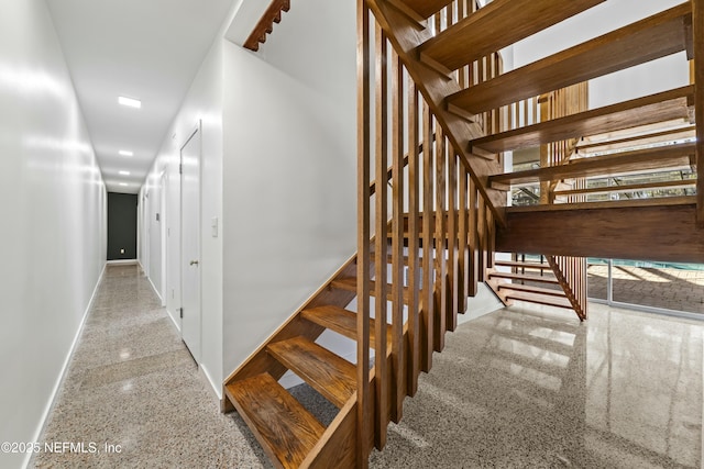 stairway with baseboards