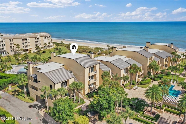 aerial view featuring a residential view and a water view