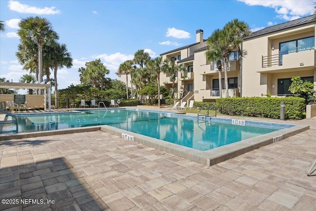 pool featuring a patio