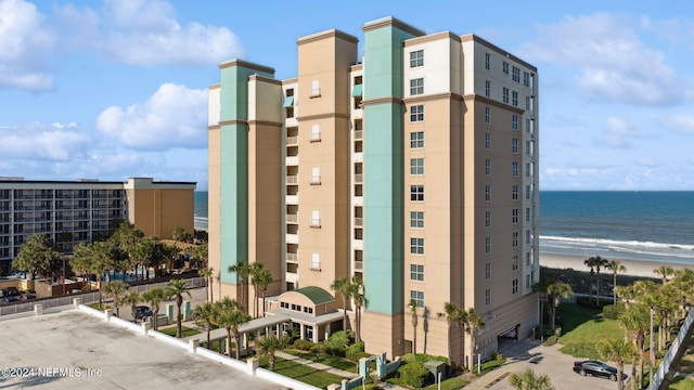 view of property with a water view