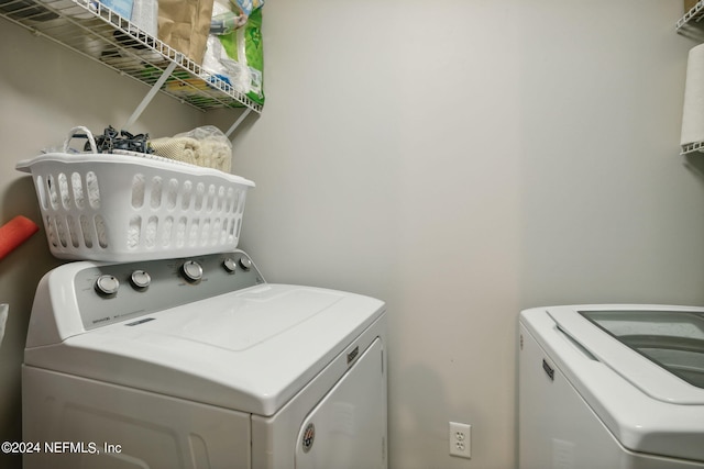 laundry room featuring washer and dryer and laundry area