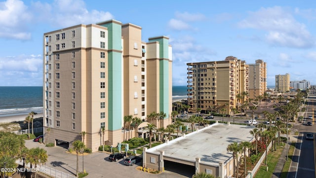 view of property with a city view and a water view