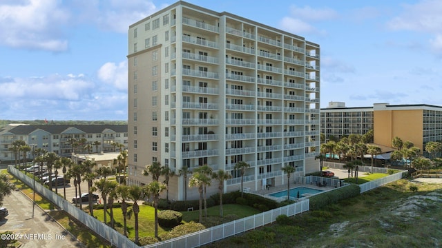 view of property with a community pool