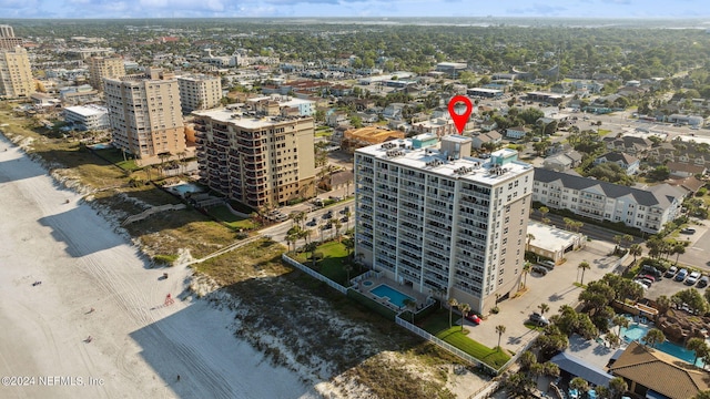 birds eye view of property featuring a city view