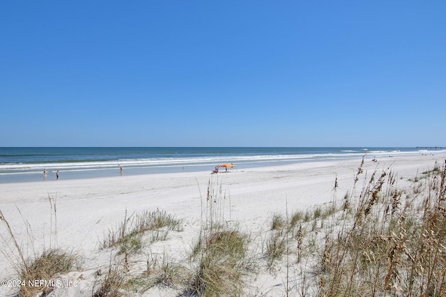 property view of water featuring a beach view