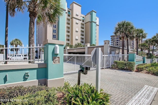 view of property featuring fence