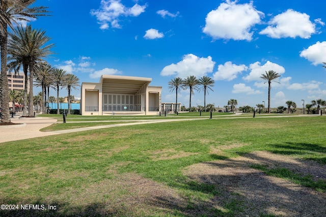 view of home's community with a lawn