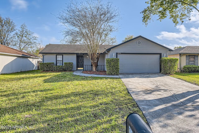 1602 Ibis Dr, Orange Park, FL 32065 - ranch-style house with stucco siding, concrete driveway, a front yard, and a garage