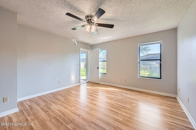 1602 Ibis Dr, Orange Park, FL 32065 - spare room with plenty of natural light, a ceiling fan, baseboards, and light wood finished floors