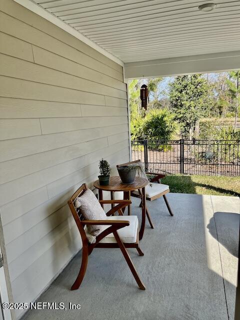 view of patio / terrace with fence