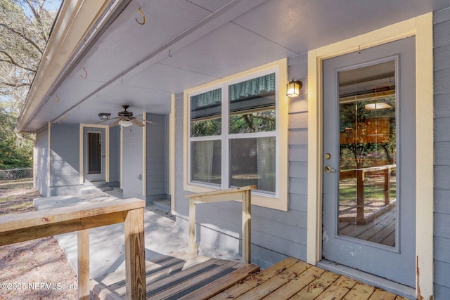 wooden terrace with a porch