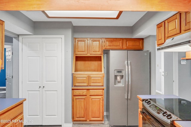 kitchen featuring under cabinet range hood and appliances with stainless steel finishes