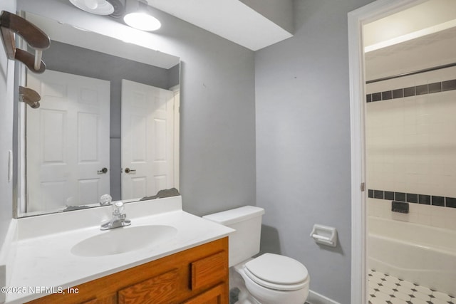 full bathroom featuring toilet and vanity