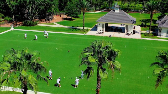 view of property's community with a gazebo and a lawn