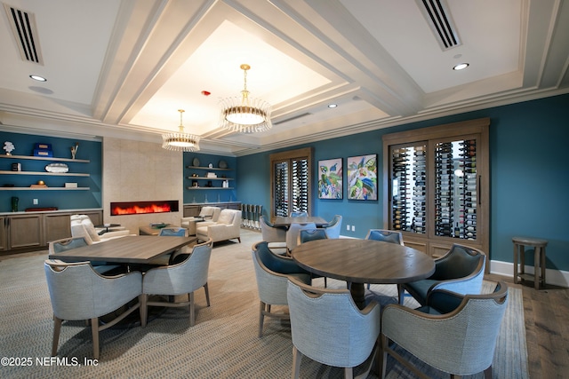 dining room featuring beamed ceiling, a notable chandelier, visible vents, and ornamental molding