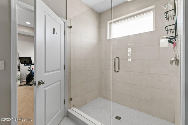 full bathroom with a stall shower