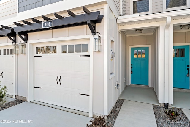 property entrance featuring a garage