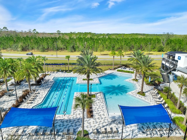 community pool with a patio