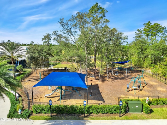 exterior space with playground community and fence